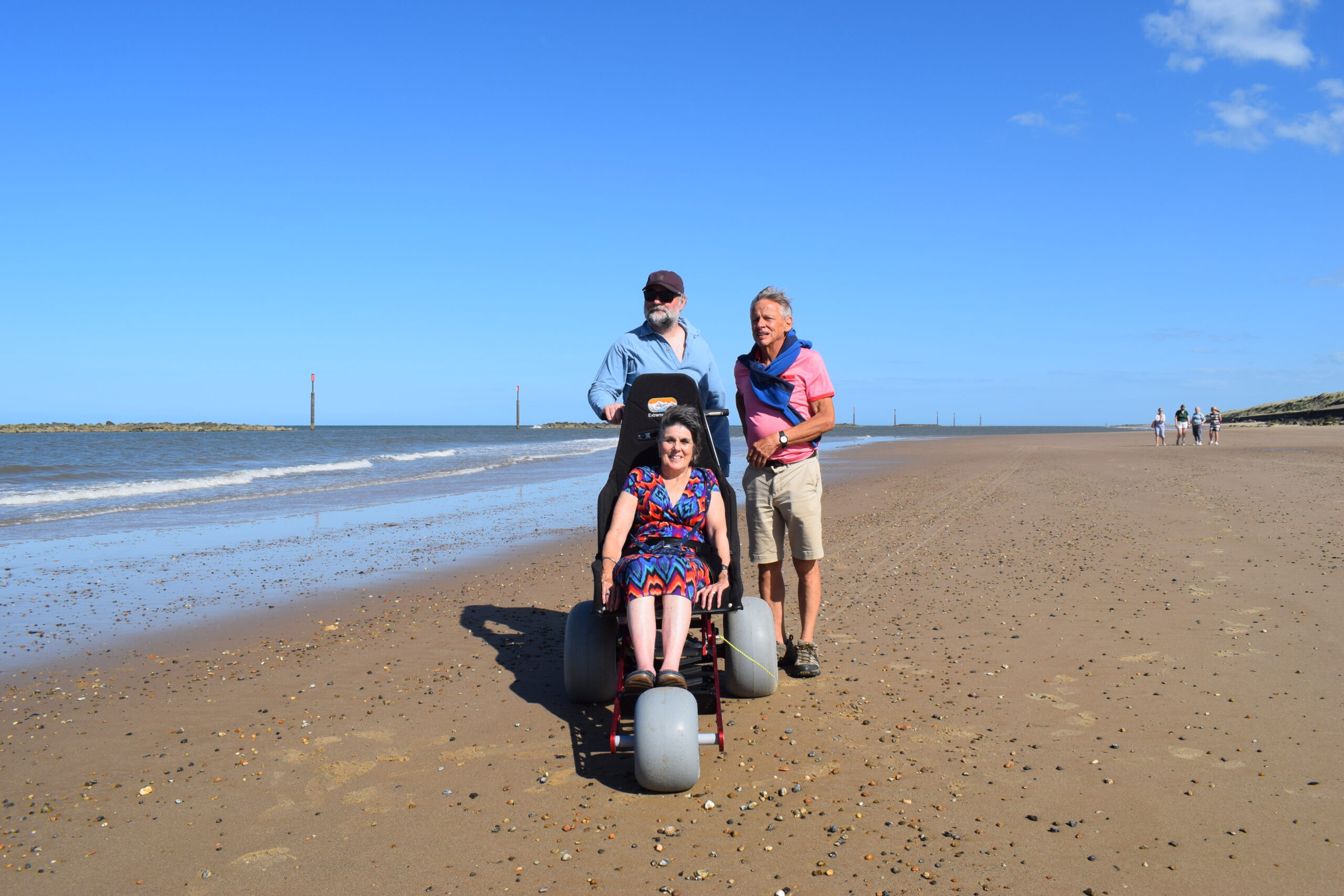 Lady using beach wheelchair